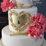 Gold heart lock wedding cake